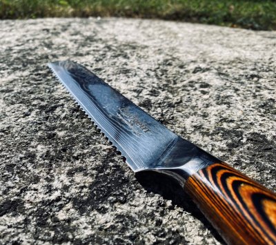 Audgeirr brödkninv närbild